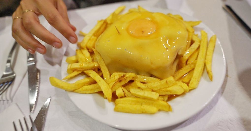 Watch: Traveling to Porto, Portugal’s and Trying the Iconic Francesinha Sandwich