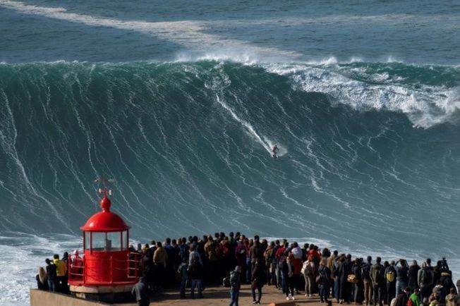 Extreme surfers catch record waves in Portuguese town -